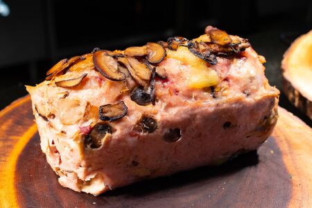 Meatloaf is a dish of ground meat that has been mixed with other ingredients and formed into the shape of a loaf, then baked or smoked.の写真素材