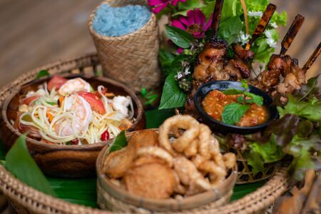 Green papaya salad is a spicy salad made from shredded unripe papaya. Originating from ethnic Lao people, it is also eaten throughout Southeast Asia.の写真素材