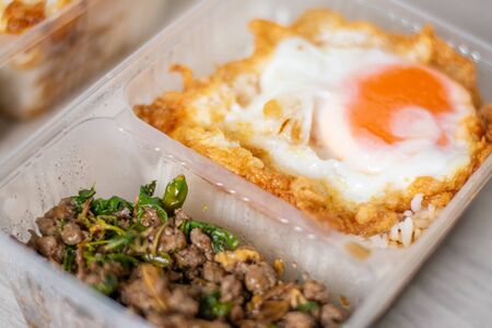 This is rice topped with stir-fried pork basil and fried egg.