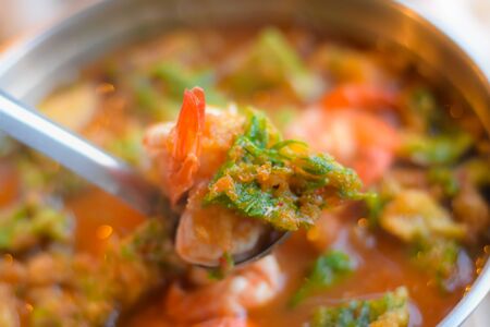 This is a Sour Curry with Vegetable Omelet Or Sour Curry with Vegetable Omelet. It is a spicy food. It is a popular food in Thailand.の写真素材