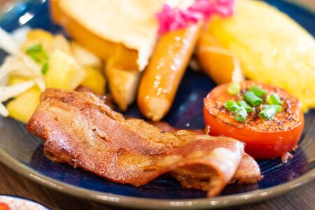Breakfast is the first meal of a day, usually eaten in the morning.の写真素材