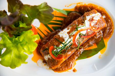 This is a Salmon Steak with spicy sauce.の写真素材