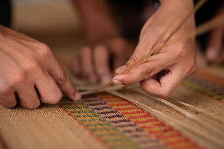 This picture shows the process of making wickerwork.