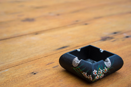 the ashtray thai art on woodの写真素材