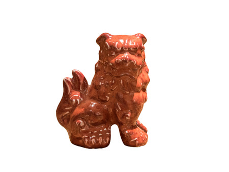 isolated Chinese lion statue on white backgroundの写真素材