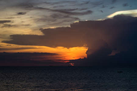 beautiful twilight sky and cloud on sea backgroundの写真素材