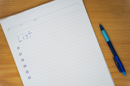 remember notepad List to do with pen on desktopの写真素材