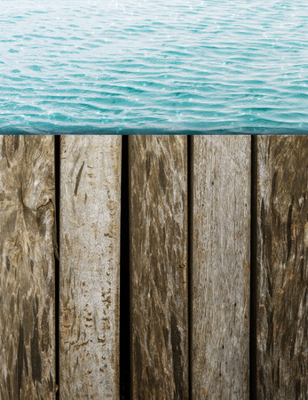 sea wave with wood platform backgroundの写真素材