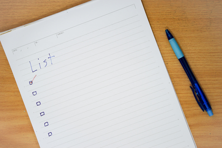 remember notepad List to do with pen on desktopの写真素材