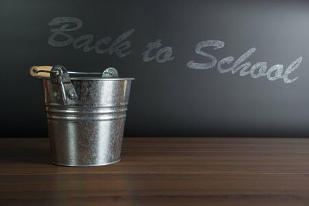 back to school blackboard background with wood floorの写真素材