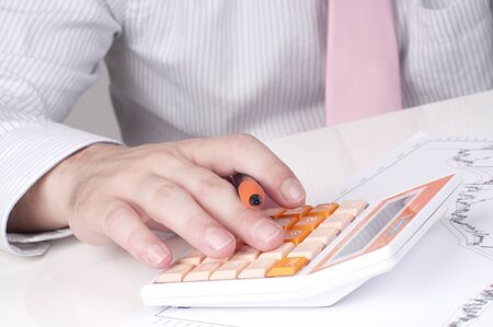 business man calculatingの写真素材