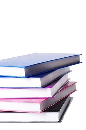 stack og colorful books on a white studio backgroundの写真素材