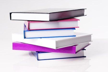 six books on a white table for cutoutの写真素材