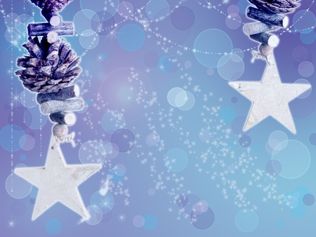 beautiful blue tinted Christmas background with stars and pinecones