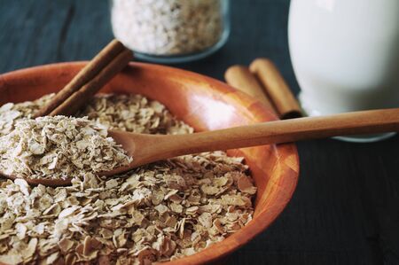oat flakes with cinnamon and milkの写真素材
