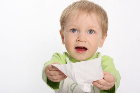 Beautiful little boy with handkerchiefの写真素材