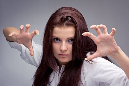 Portrait of a young aggressive womanの写真素材