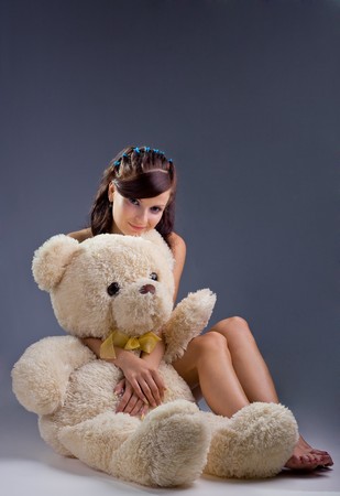 Smiling sexy woman with toysの写真素材