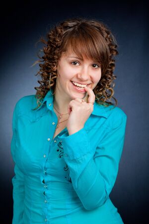 Woman with finger on lipの写真素材