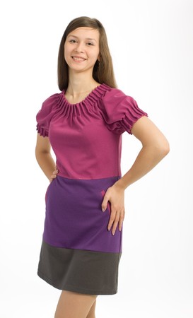 Young beautiful woman in dress posingの写真素材