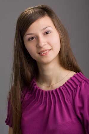 Closeup portrait of a happy young womanの写真素材