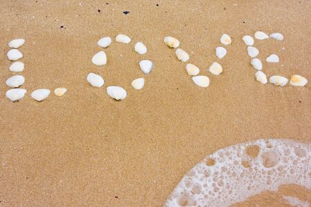 Love in sand on a beachの写真素材