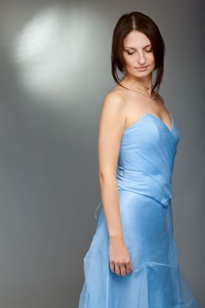 beautiful young woman posing in studioの写真素材