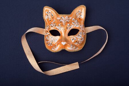 orange mask isolated on a black backgroundの写真素材