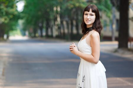 Portrait of naturally beautiful woman in her twenties, shot outside in natural sunlightの写真素材