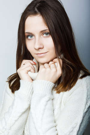 Portrait of a beautiful female model on white backgroundの写真素材