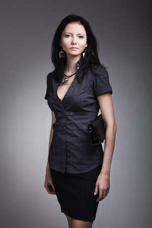 fashion model portrait on grey backgroundの写真素材