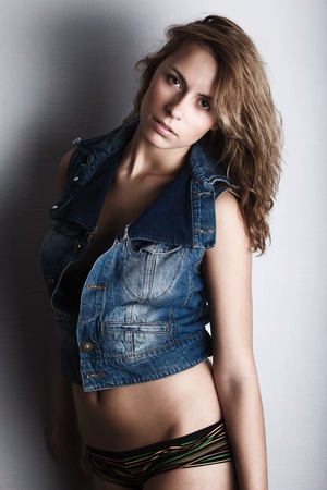 beautiful woman in jeans gownの写真素材