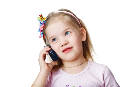 Full isolated studio picture from a little child with cellの写真素材