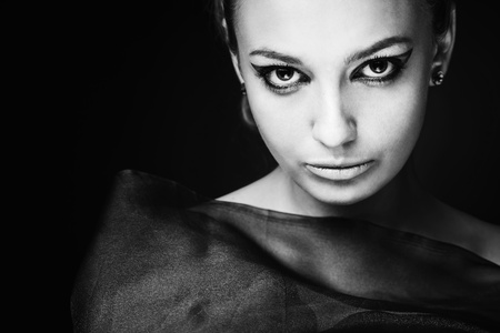 a beauty girl on the dark backgroundの写真素材