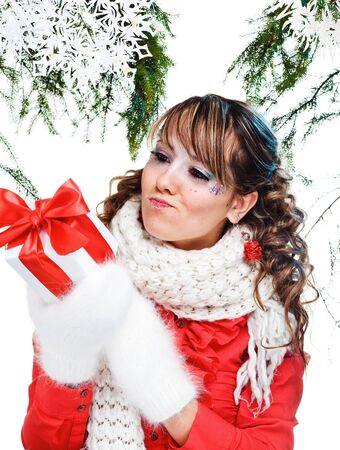 sexy woman with present wrapped in white paper, isolated on whiteの写真素材