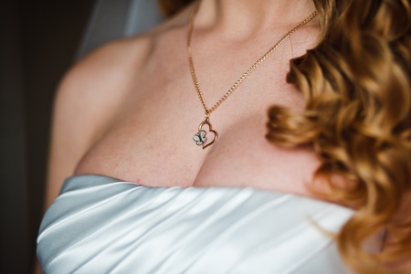 Beautiful adornment on neck of young brideの写真素材