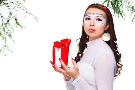 sexy woman with present wrapped in white paper, isolated on whiteの写真素材