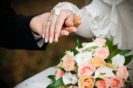Bride with wedding  bouquet, closeupの写真素材