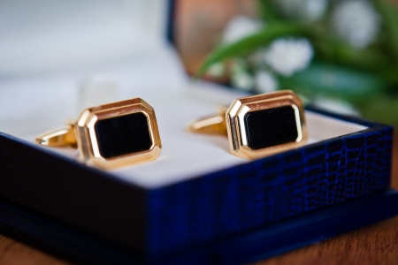 cufflinks on the blue leather boxの写真素材