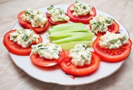 fresh tomato salad with leek and eggの写真素材