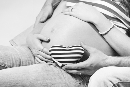 belly of pregnant woman monochrome on a white backgroundの写真素材