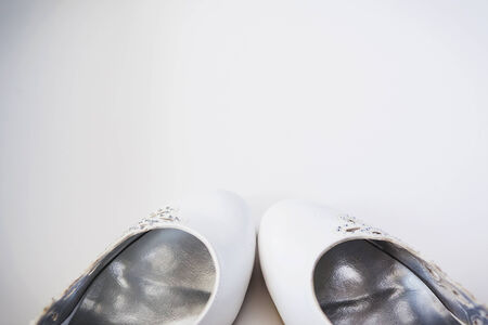closeup photo of beautiful bride's shoesの写真素材