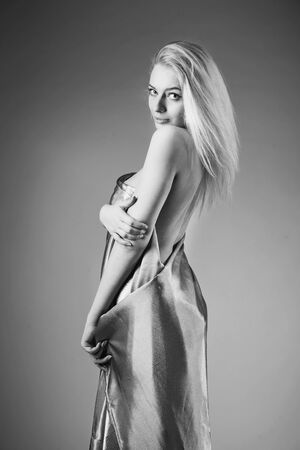Young woman studio fashion portrait. Black and white.の写真素材
