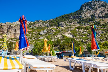 view of the beach with chairs and umbrellas. Greeceのeditorial素材