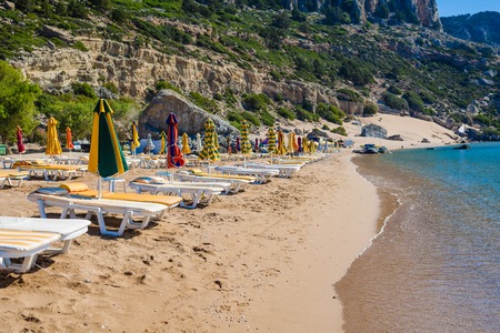 view of the beach with chairs and umbrellas. Greeceのeditorial素材