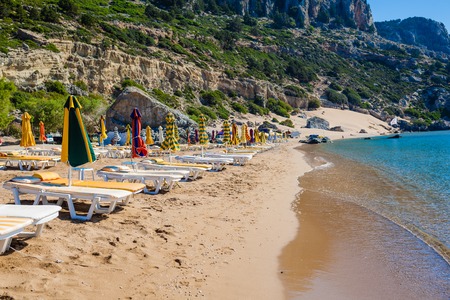 view of the beach with chairs and umbrellas. Greeceのeditorial素材