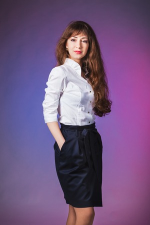 Beautiful woman with colored backgroundの写真素材