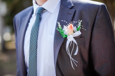 Groom with the boutonniere and tieの写真素材