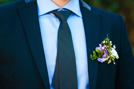 Groom with the boutonniere and tieの写真素材