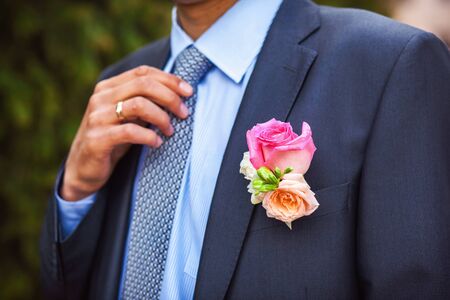 Groom with the boutonniere and tieの写真素材